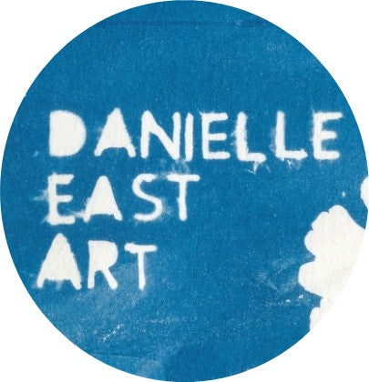 Round Danielle East ART, blue and white Cyanotype typewrite text logo